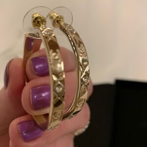 Authentic gorgeous 2 inches golden Chanel hoops with CC logo and crystals.Limit